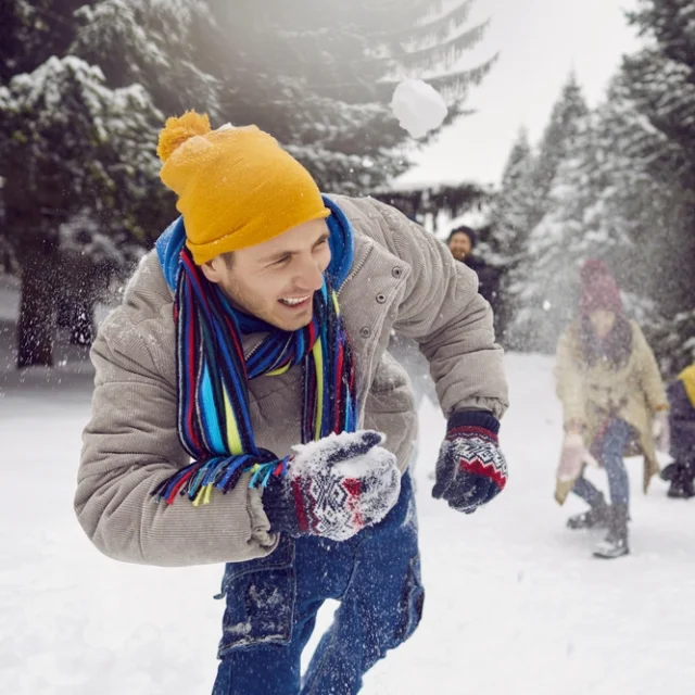 Snowball fight between friends