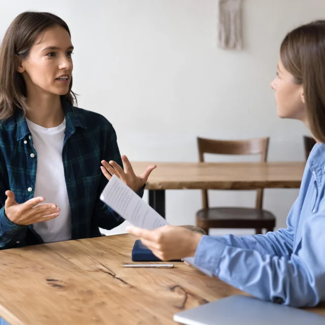 Two women talking