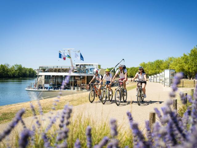 Family bike ride on La Voie Bleue in Trévoux