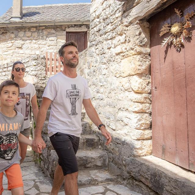Stroll through the cobbled streets of Montbrun, located between the Gorges du Tarn and the Causse Méjean.