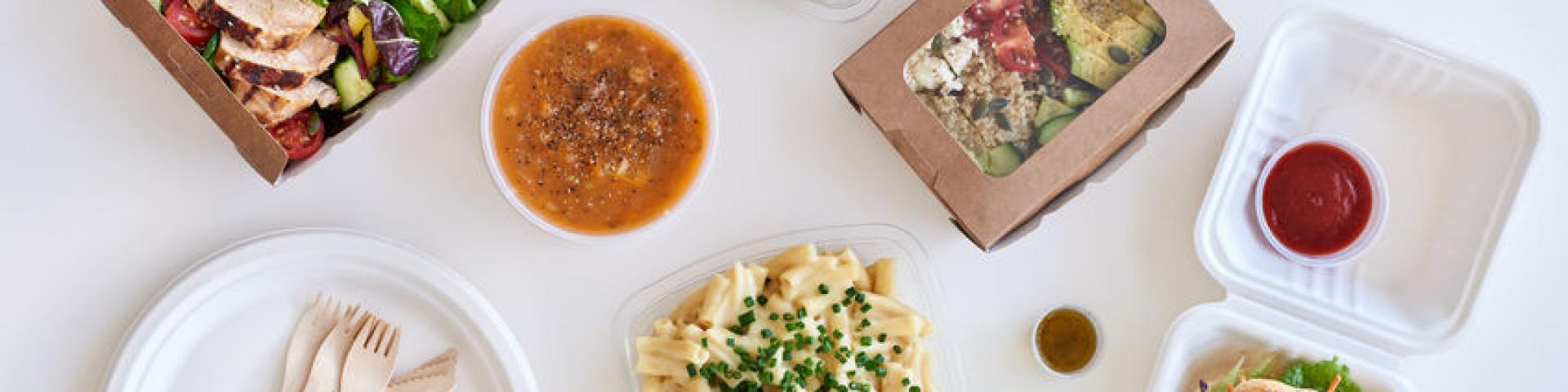 Different options variety assortment of takeout food gourmet takeaways