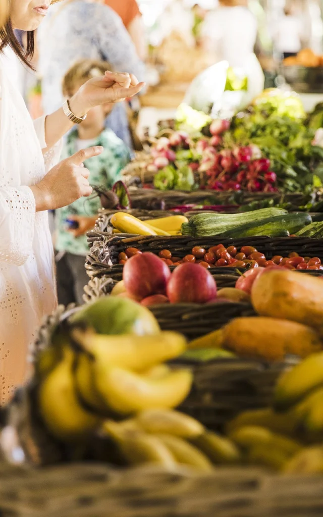 People Buying Vegetable Stall Market