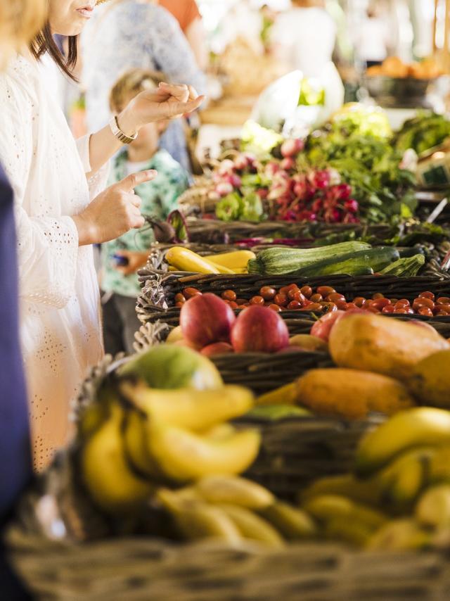 People Buying Vegetable Stall Market