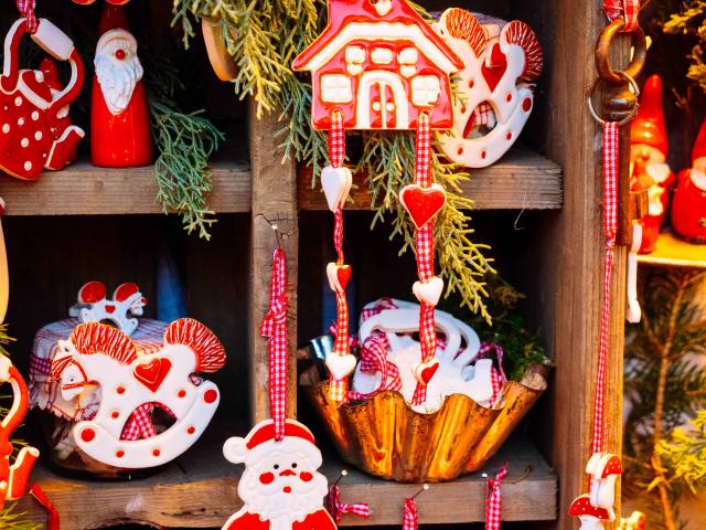 Christmas market kiosk details with santa claus figurine, retro toned