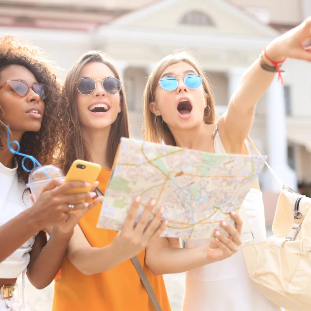 Tourists in cities with a map