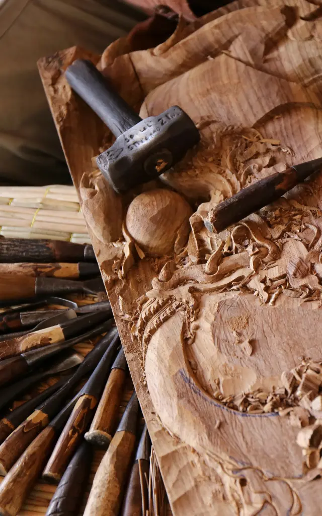 craftsman carving wood, thai art