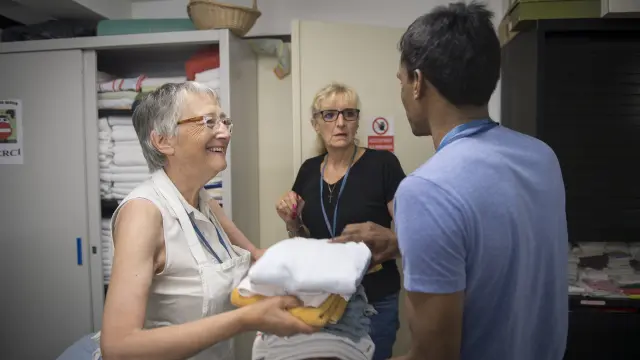 Vrijwilligers organiseren werk in de paviljoens