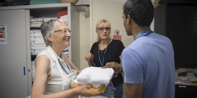Volunteers organize work in the pavilions