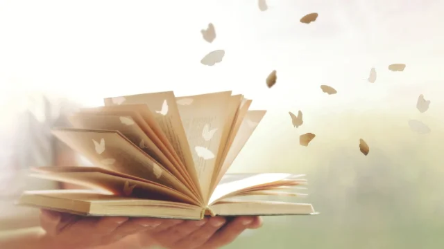 surreal paper butterflies come out free from the pages of a book, abstract concept