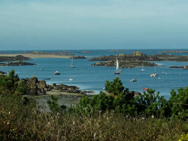 Bay with several boats and rocky islands