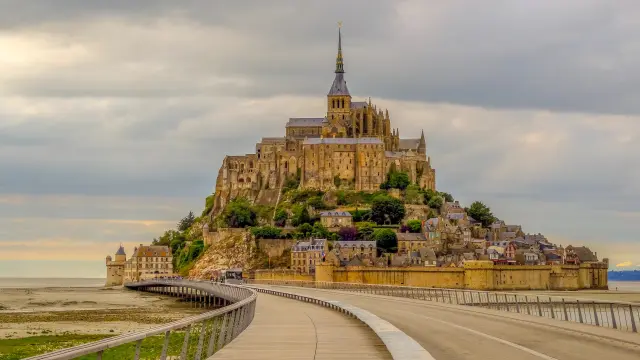 Mont Saint-Michel with a road leading to the main structure
