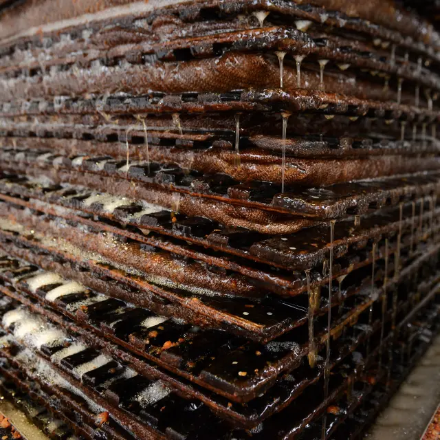 Stack of cooked mussels with threads of broth