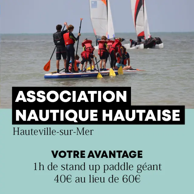 Un groupe de personnes participant à un cours de paddle géant