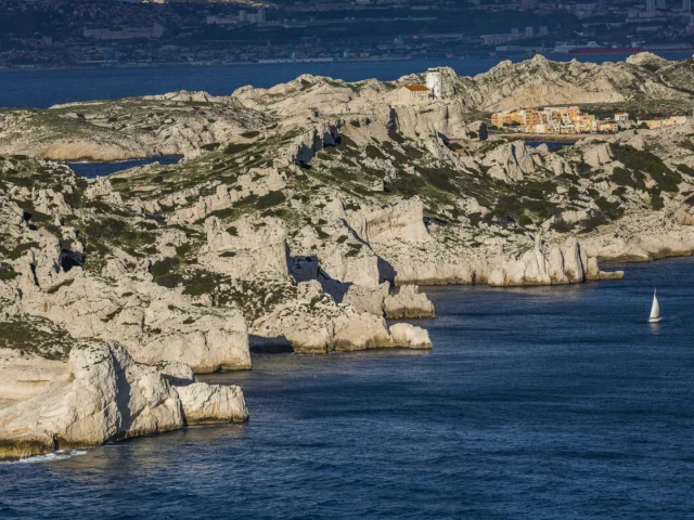 The contrast between the white rocks of the Frioul islands and the blue of the sea