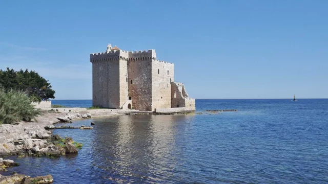 The fortified monastery of Lérins Abbey on its headland, level with the water