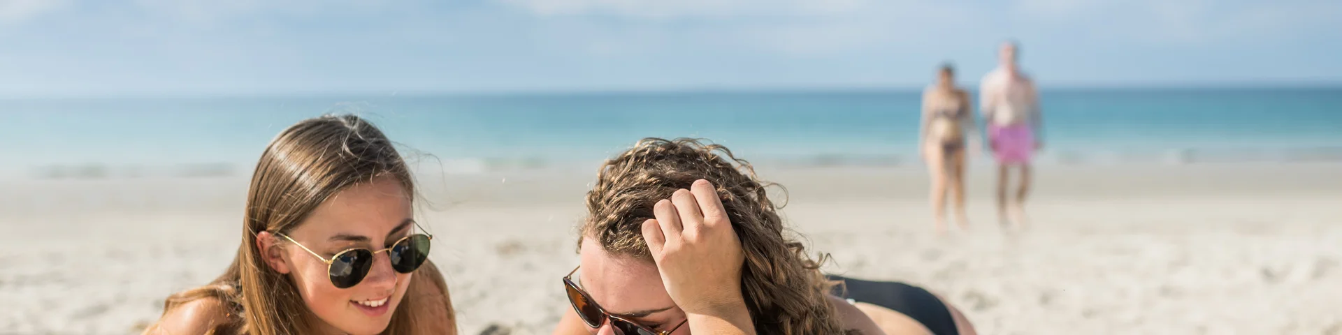 Reading on the beach at Maner Coat Clevarec