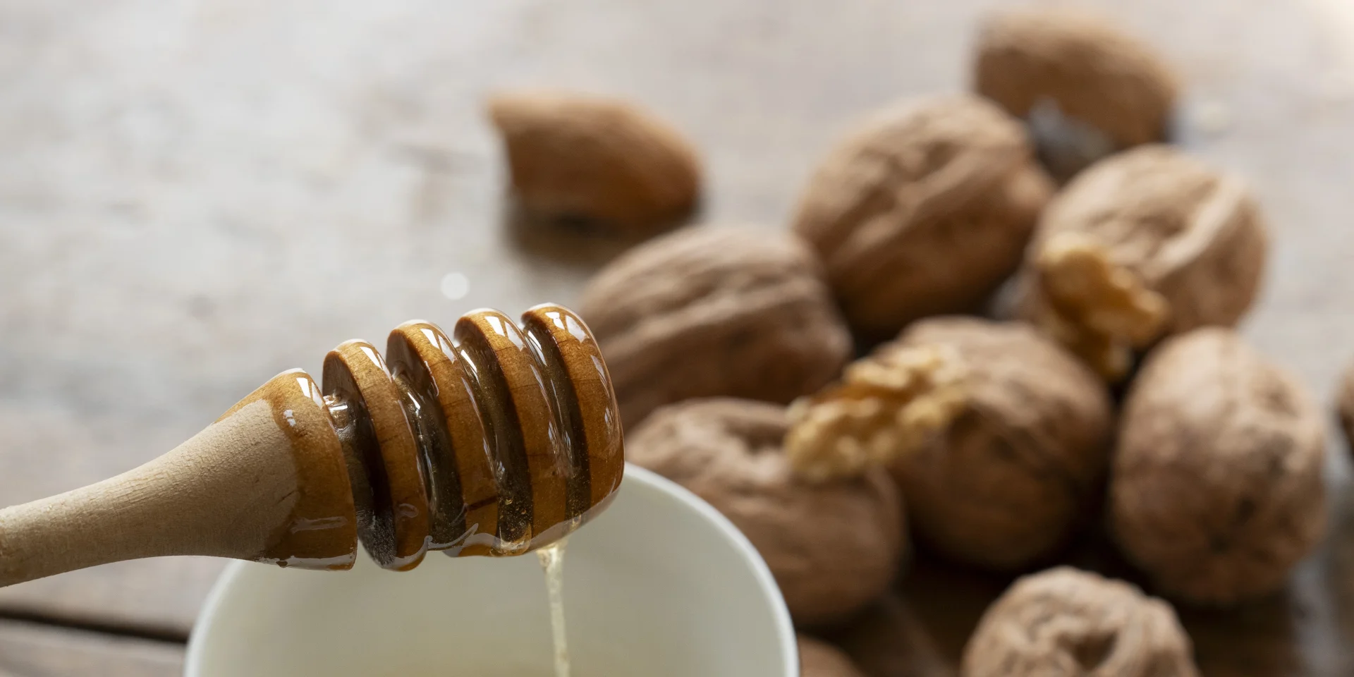 Local honey in front of nuts
