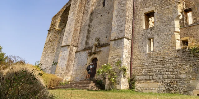 Hiker on the GR 652 at the Abbaye Nouvelle de léobard