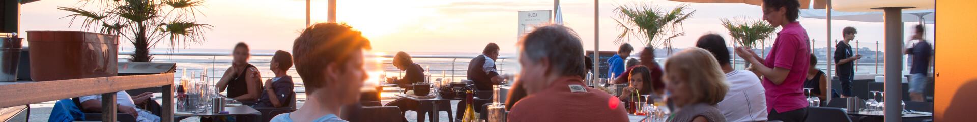 Terrace of Le Comptoir JOA restaurant in Saint-Pair-sur-Mer
