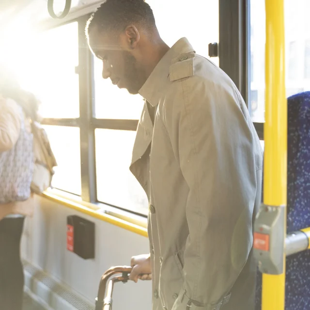 Medium Shot Man With Walking Frame Traveling By Bus