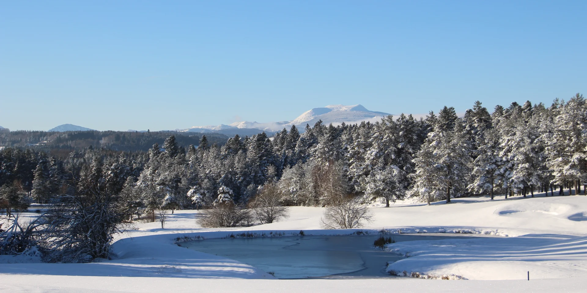 Snow-covered Mezenc from the golf course at Chambon-sur-Lignon
