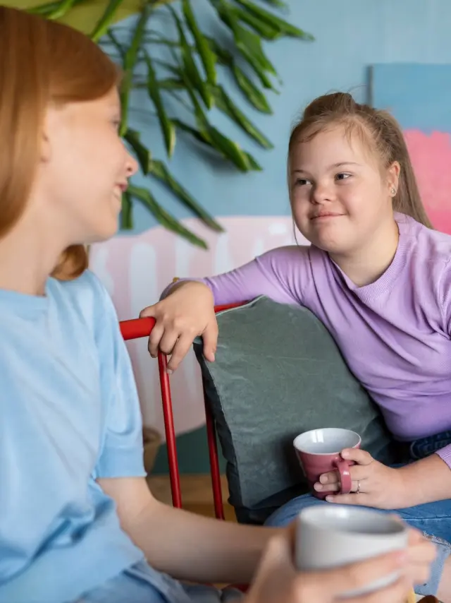 Young girls chatting in a café