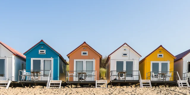 A wide angle shot of Camping De Nolle in Vlissingen, Netherlands under a blue sky