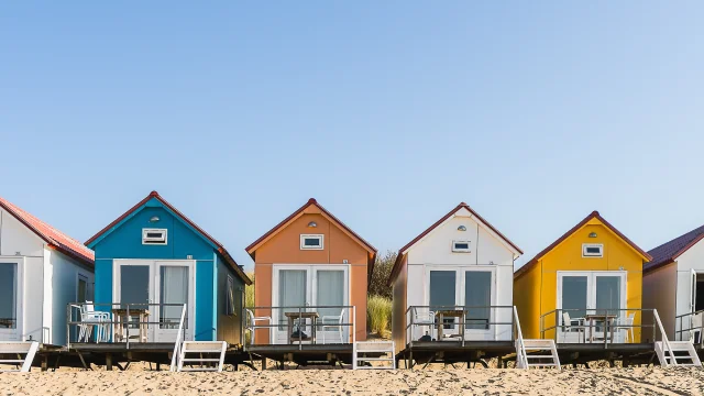 A wide angle shot of Camping De Nolle in Vlissingen, Netherlands under a blue sky
