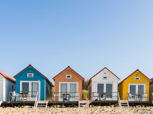 A wide angle shot of Camping De Nolle in Vlissingen, Netherlands under a blue sky