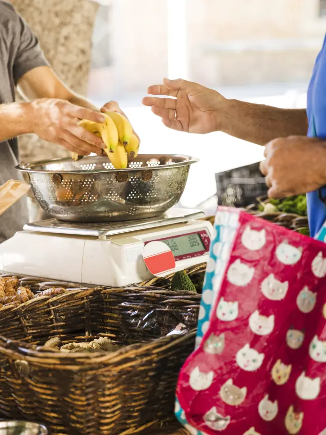 Man Holding Bag Buying Bananas From Fruit Seller Market 1