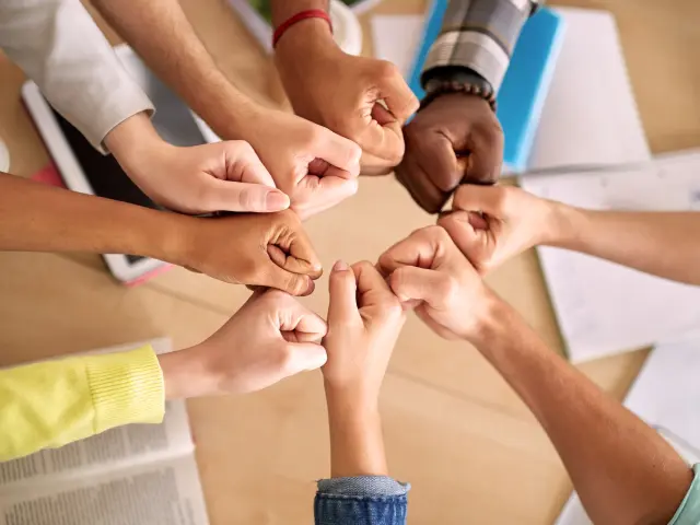 Education School Success Teamwork People Concept Group International Students Making Fist Bump Table1