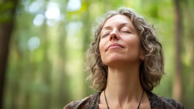 A Canadian Woman Enjoys Fresh Air In A Serene Forest Environment