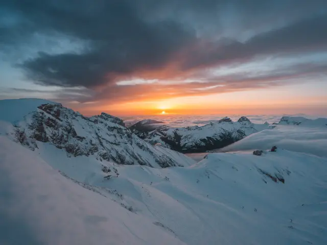 Sunset over the snow-capped mountains in the Dévoluy massif.