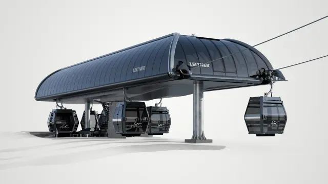 Maquette de la gare de télécabine du Jas à Superdévoluy avec cabines vitrées noires sous un large auvent métallique.