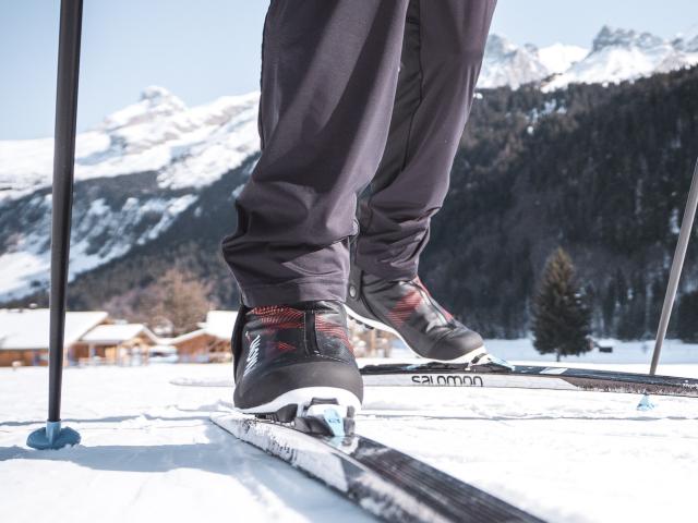 Cross-country skis sliding on the snow