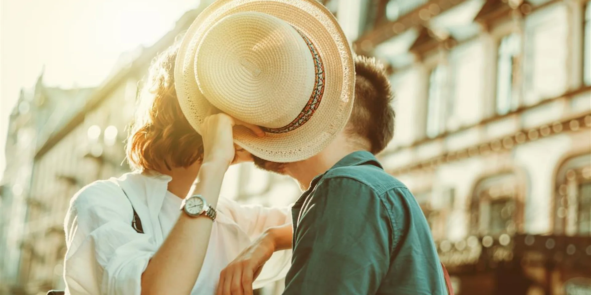 Romantic youth concept. Young stylish hipster couple in love at the city.