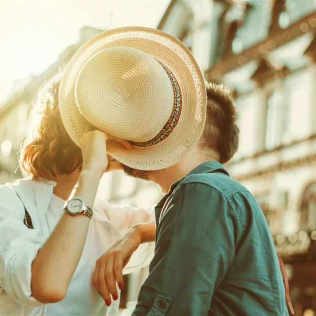 Romantic youth concept. Young stylish hipster couple in love at the city.