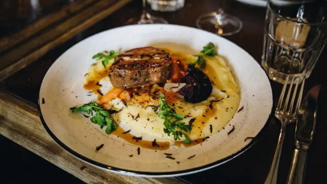 Porc confit et sa purée de truffes