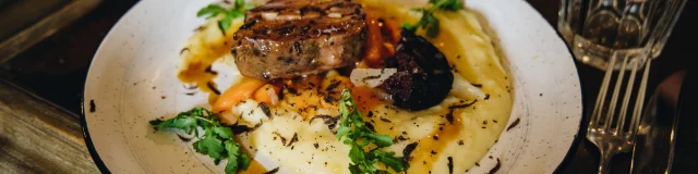 Porc confit et sa purée de truffes