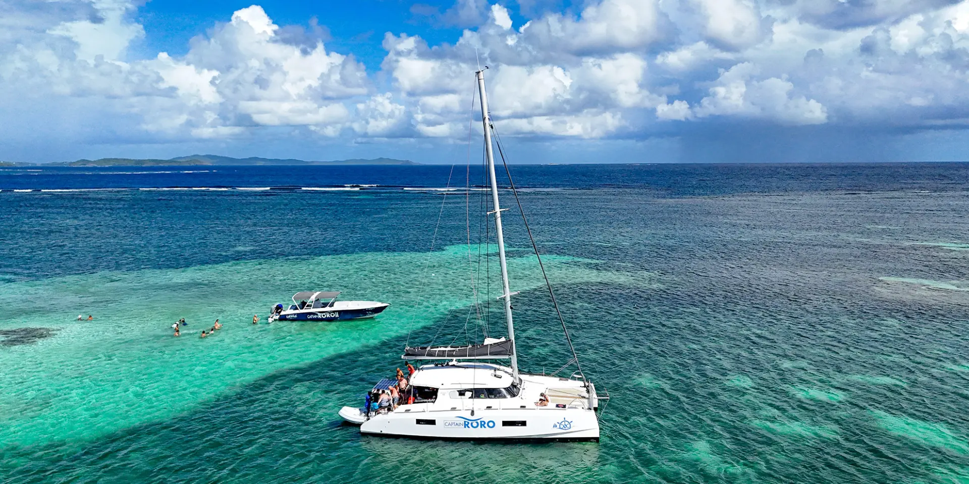 Capitaine Roro Catamaran et Bateau à moteur Baignade aux fonds blanc de la Baignoire de Joséphine François Martinique