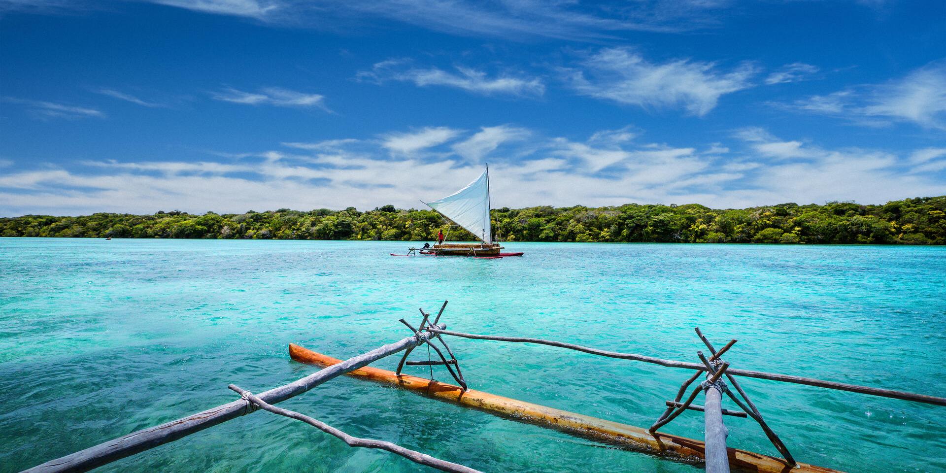 Traditional pirogue on Upi Bay