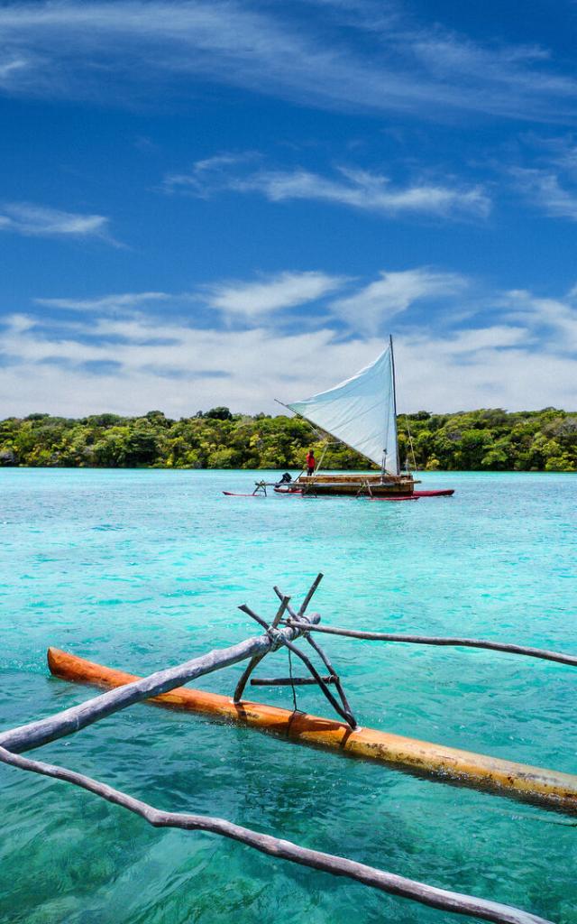 Traditional pirogue on Upi Bay