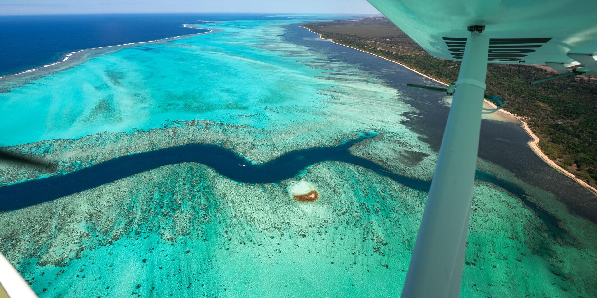 Microlight flight over the lagoon and the shark fault in Bourail, New Caledonia.