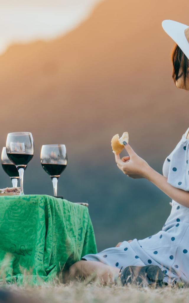 A glass of wine at sunset in New Caledonia