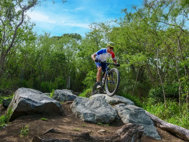Ride the mountain bike trails at the Boucles de Tina in Nouméa