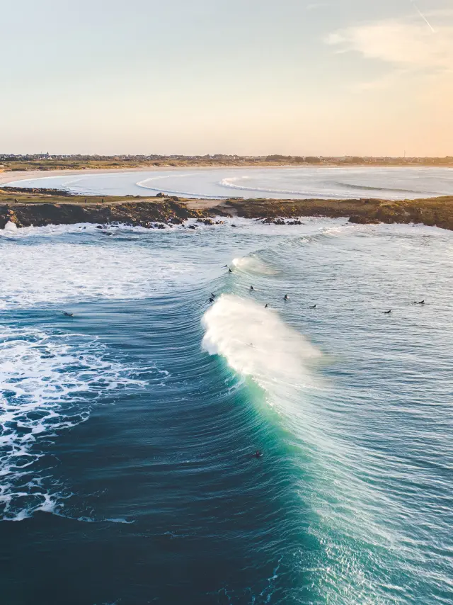 Surfers at Pointe de La Torche - Plomeur