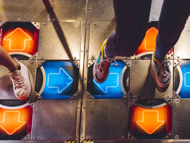 High View Women Playing Dancing Arcade