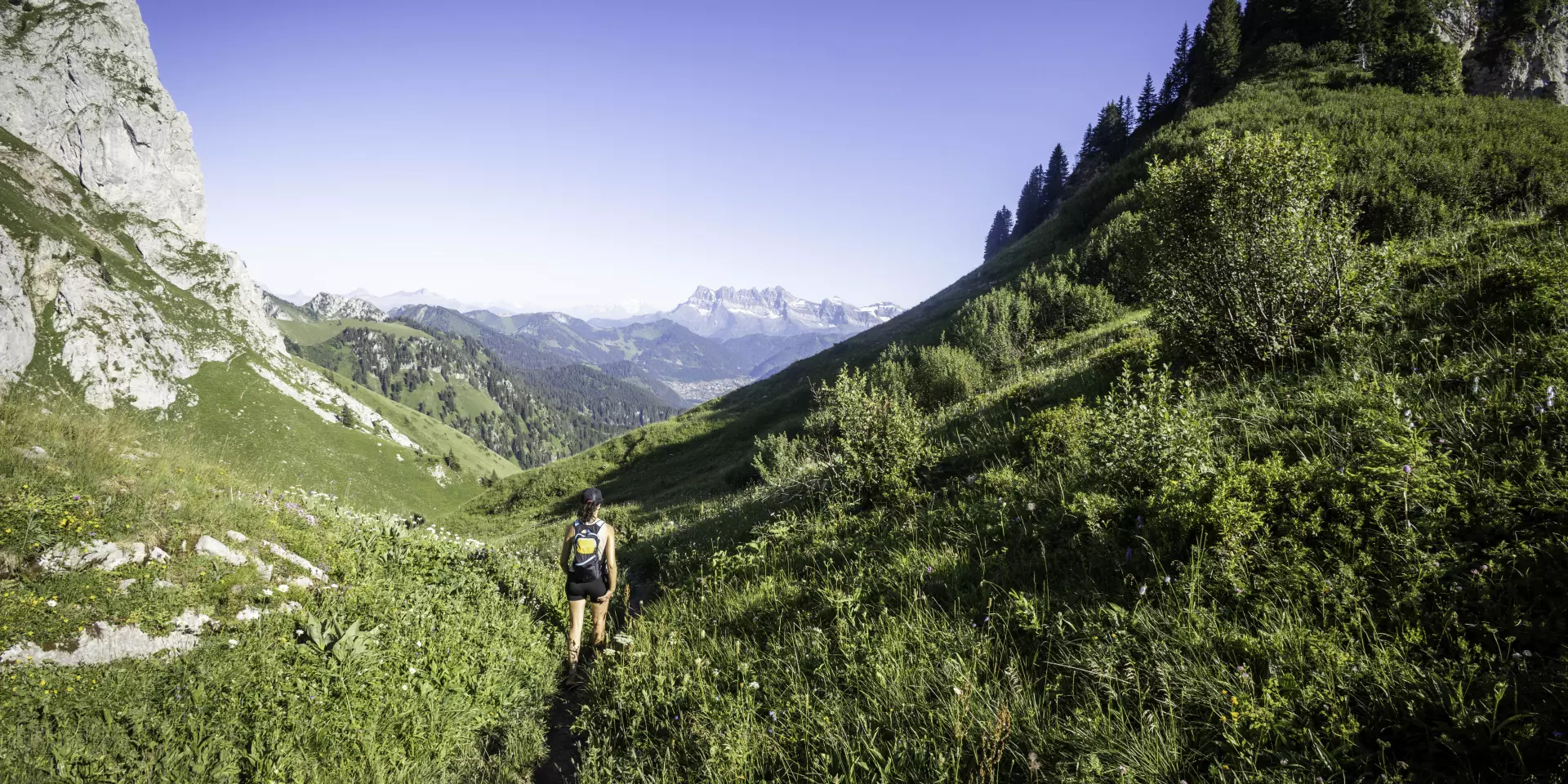 a hiker among the mountains