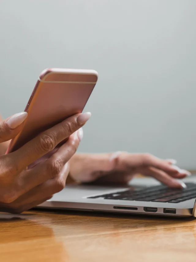 Woman Hands Using Phone Laptop Min