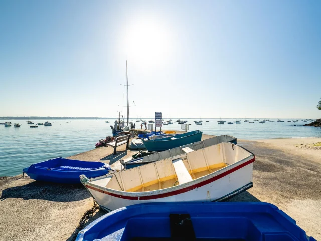 Coloured dinghies at the Beg-Meil slipway in Fouesnant